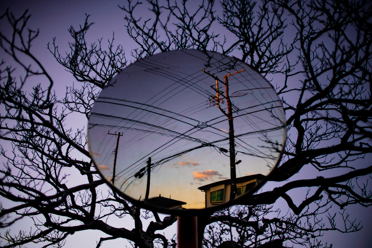 intricate curved mirror