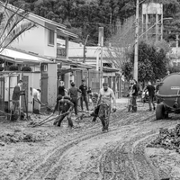 The force of water in a flooded city.
