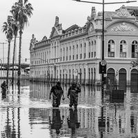 The force of water in a flooded city.