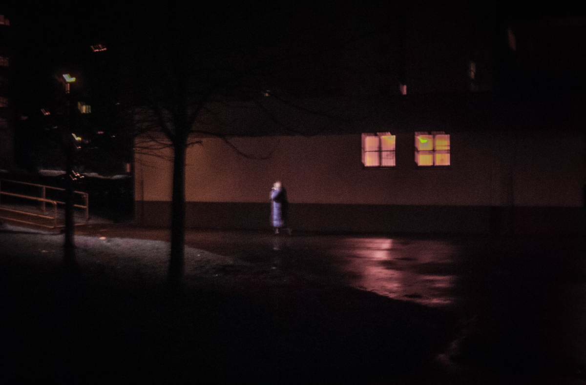 walking and smoking a cigarette