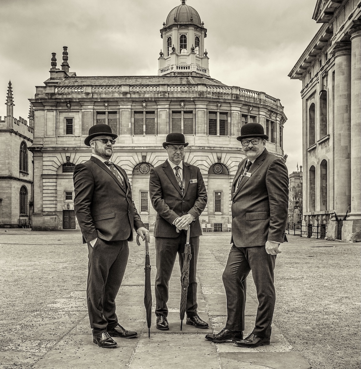 Three gentelmen in bowler hats