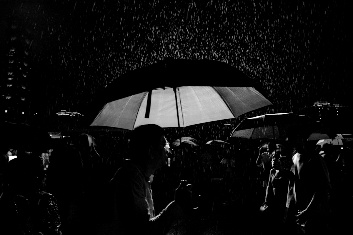 Silhouettes in the Rainy Night