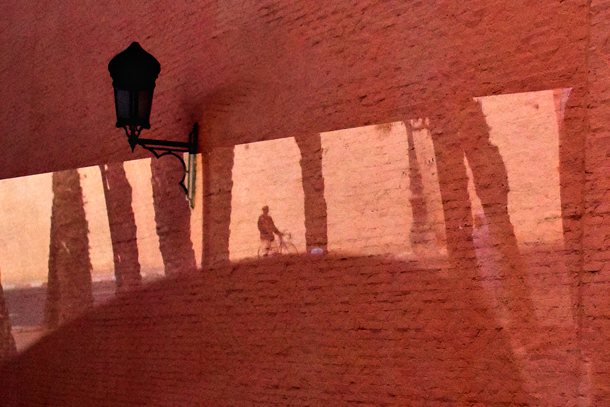 Riding a bike on the walls of Marrakech