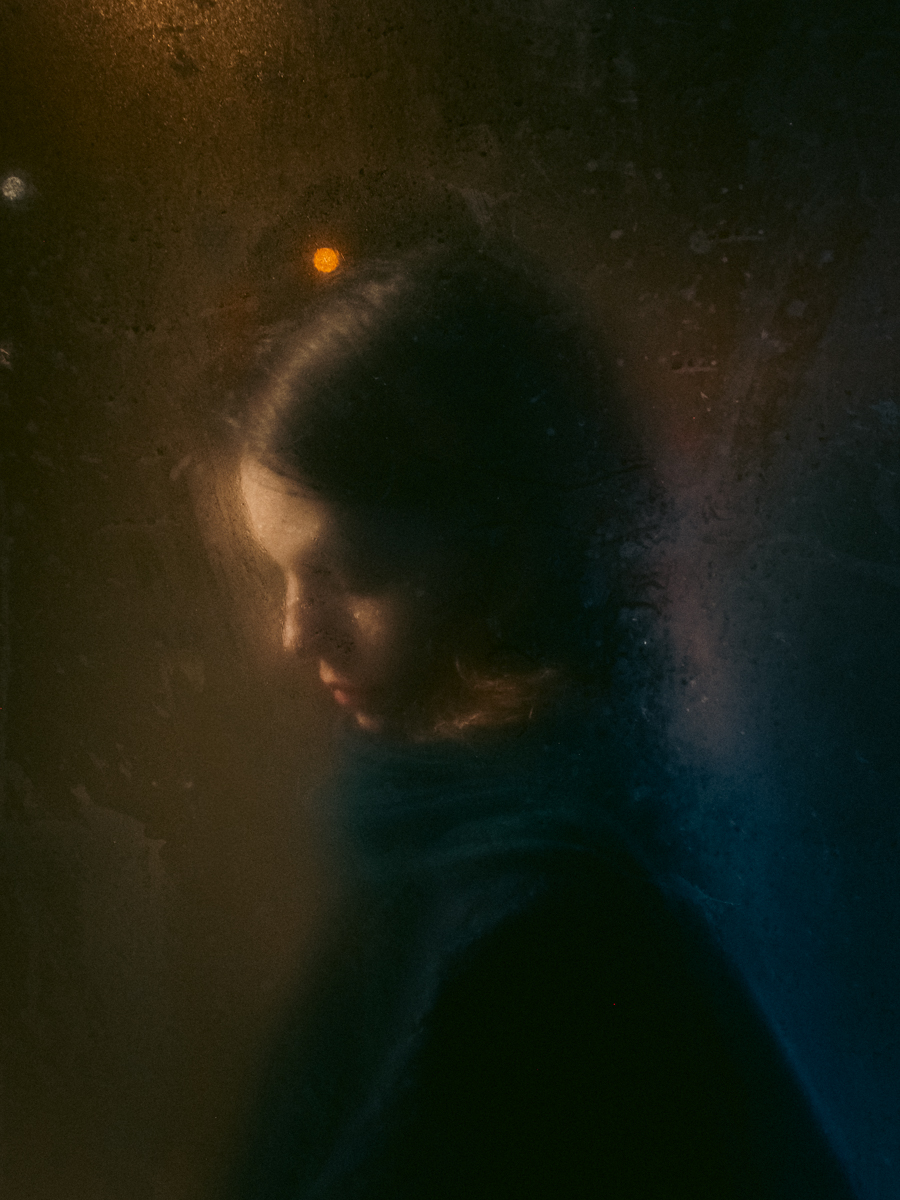 A street portrait from a bus stop.