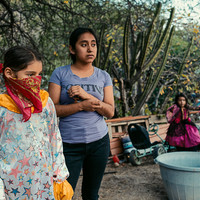 When the Masks Walk the Hills